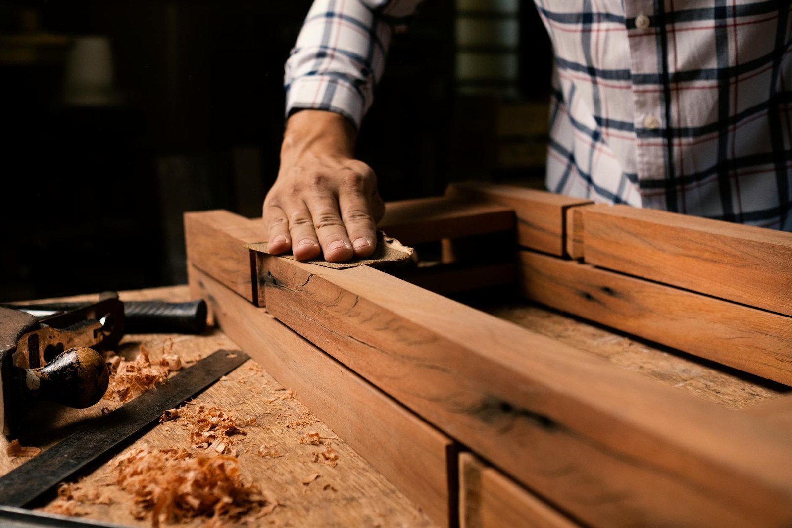 Adelaide cabinet maker building bespoke kitchen cabinetry in a workshop with shop drawings