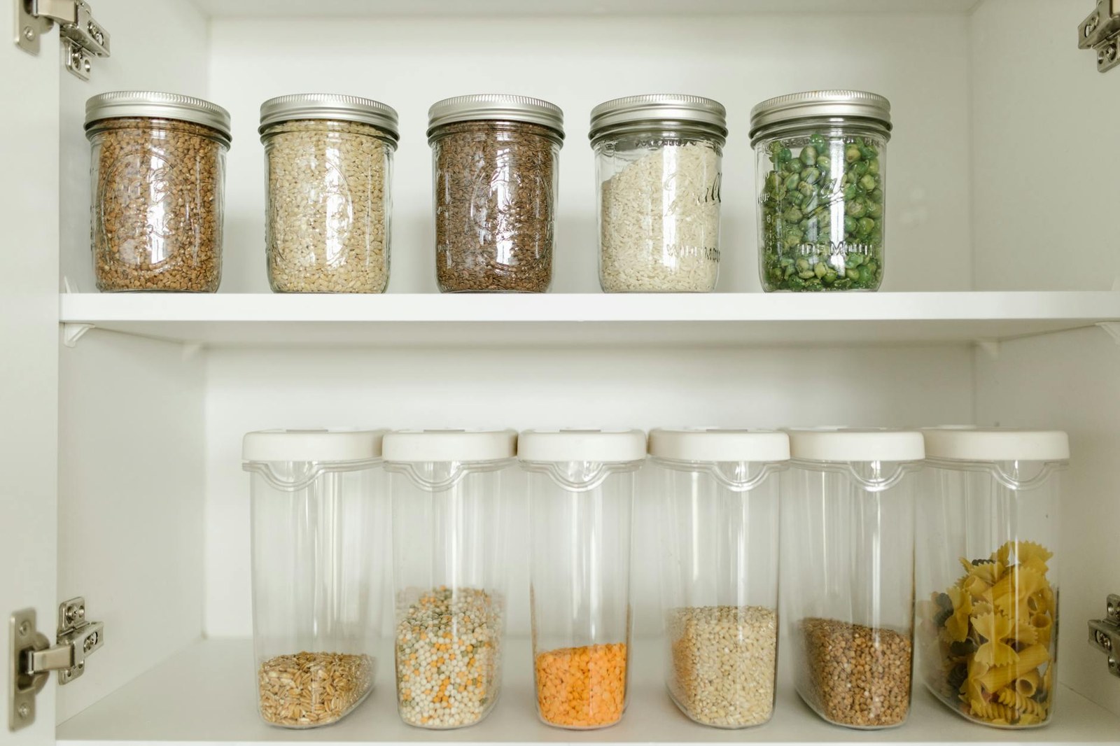 Custom pantry with pull-out drawers and container storage in an Adelaide kitchen